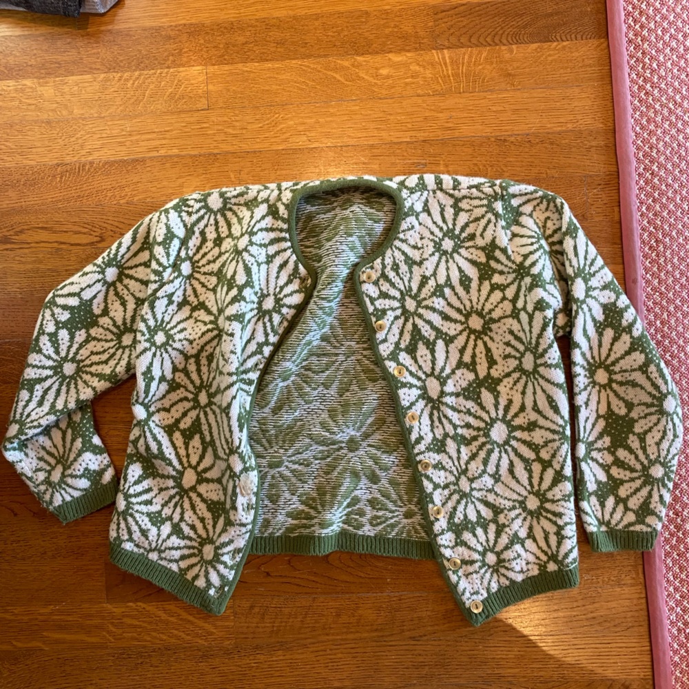 Green and white sweater
